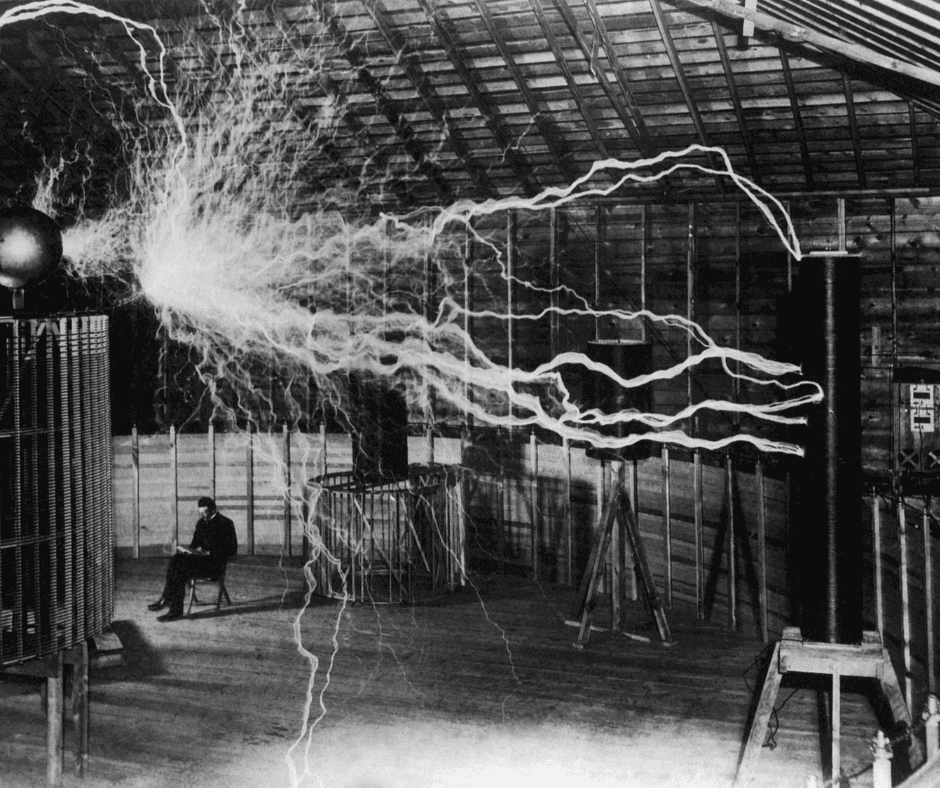 An image of Nikola Tesla and his electricity experiments