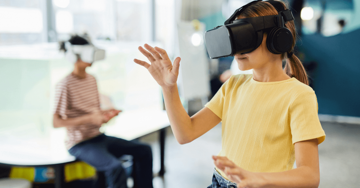 A child wearing VR goggles plays